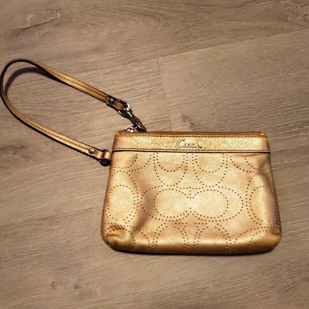 EUC Metallic gold Coach brand hand wristlet